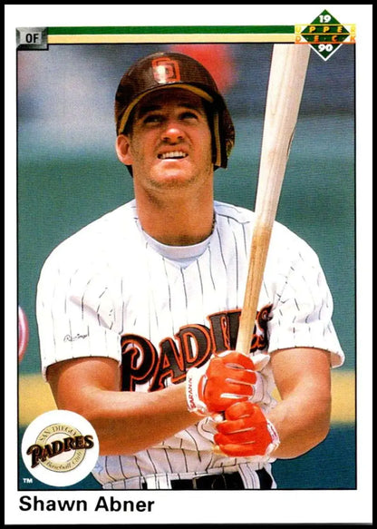 Shawn Abner in San Diego Padres pinstriped uniform holding a bat