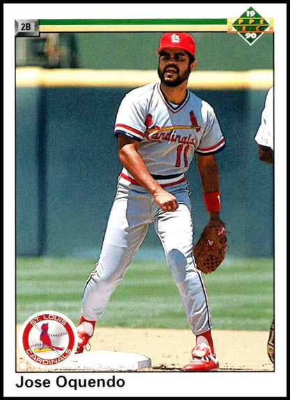 Jose Oquendo in St. Louis Cardinals uniform fielding, featured on baseball card