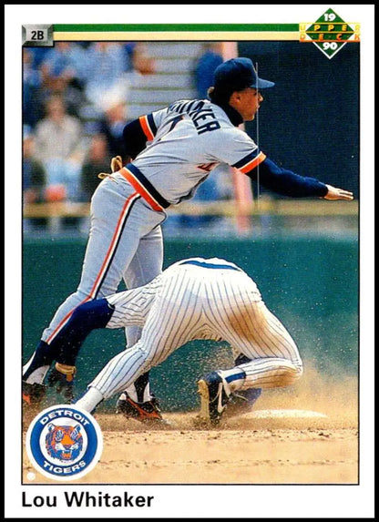 Sliding runner at second base in a baseball action scene featuring Lou Whitaker and the Detroit Tigers