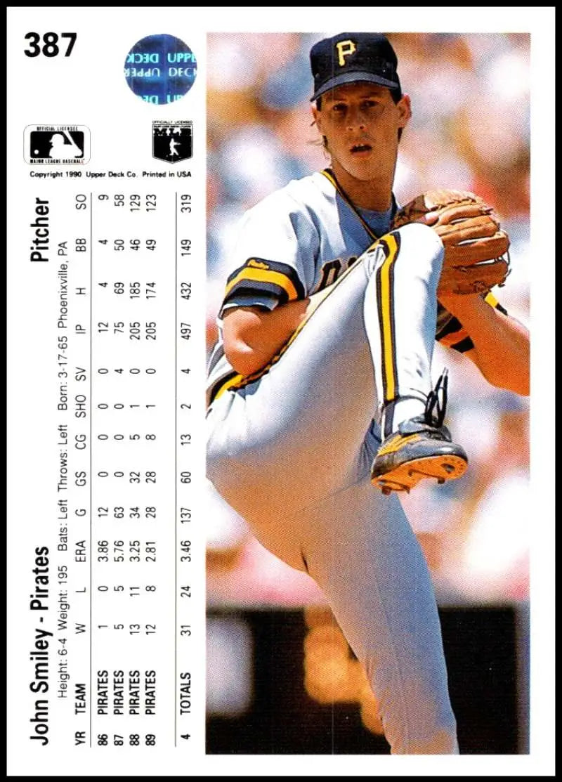 John Smiley pitching in white uniform with black cap on 1990 Upper Deck baseball card