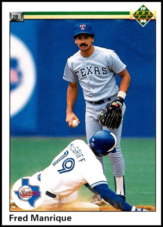 Fred Manrique 1990 Upper Deck Baseball Card depicting play at second base in Rangers vs Blue Jays