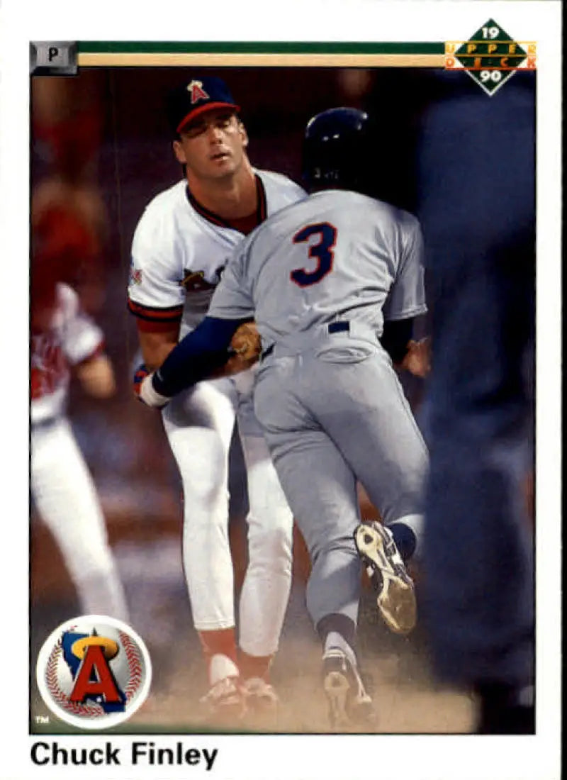 Close play at first base on the 1990 Upper Deck Chuck Finley UER California Angels card