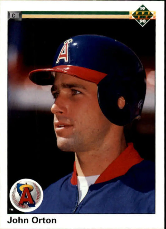 California Angels player John Orton in uniform and navy helmet on baseball card