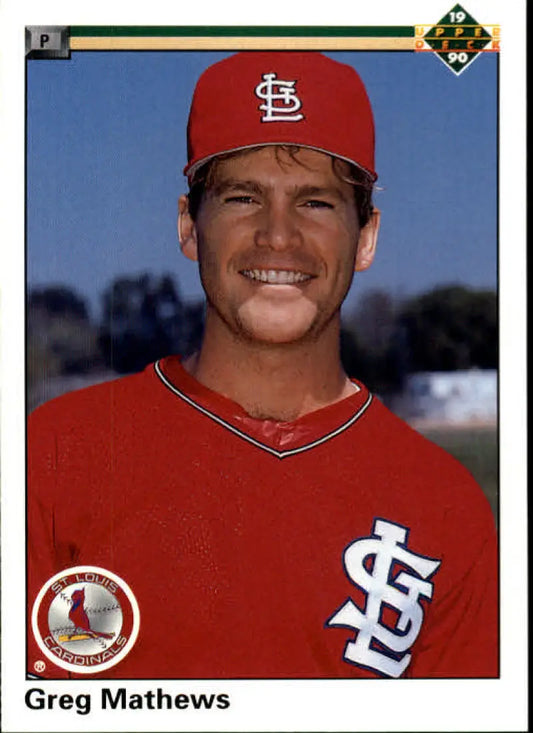 Greg Mathews in a red St. Louis Cardinals uniform on a baseball card