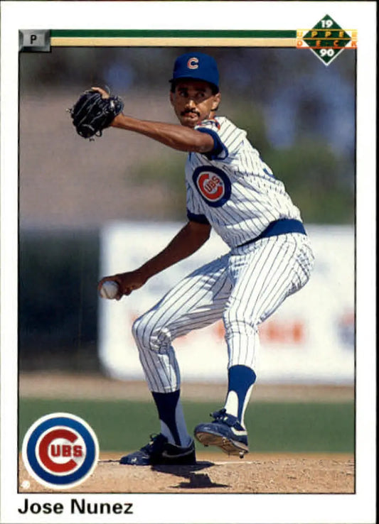 Jose Nunez mid-pitch on the mound for the Chicago Cubs baseball card