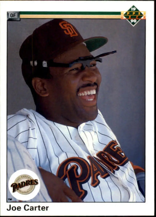 Joe Carter in San Diego Padres uniform smiling on 1990 baseball card