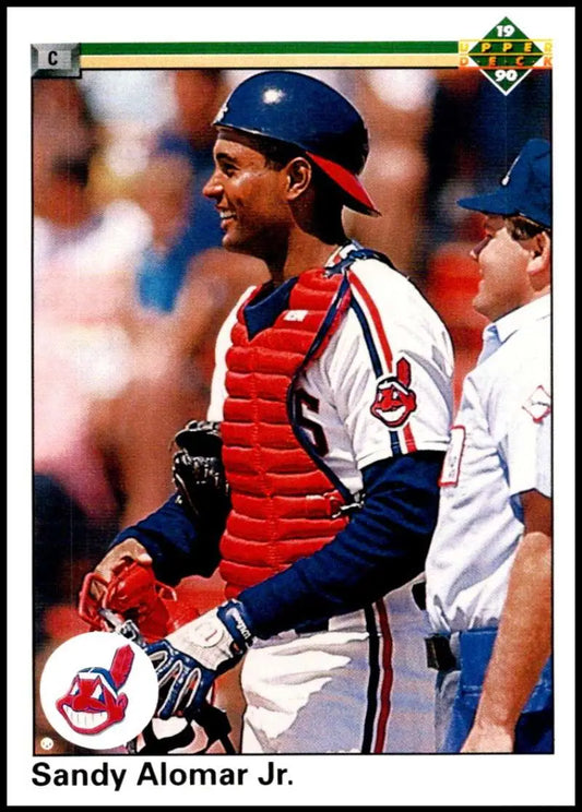 Baseball catcher in Cleveland Indians gear with Sandy Alomar Jr. on 1990 baseball card