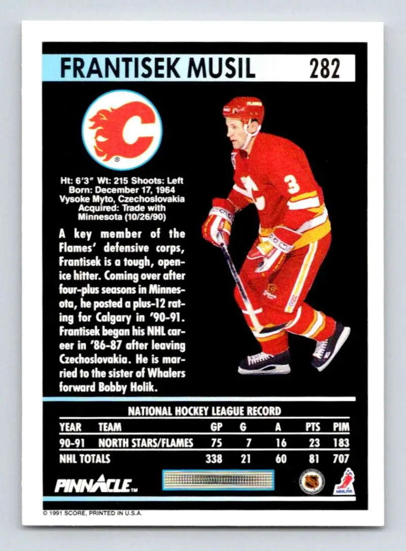 Hockey card of Frank Musil in Calgary Flames red and yellow uniform design