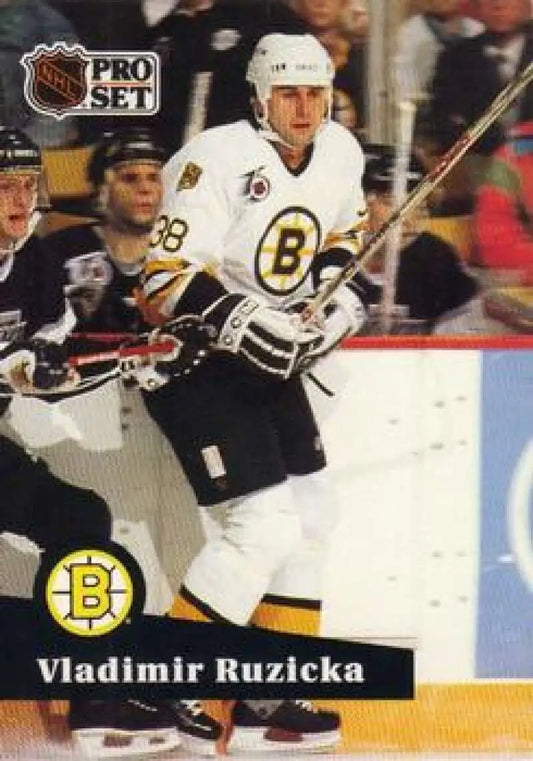 Hockey player in Boston Bruins jersey #39, featuring Vladimir Ruzicka hockey card