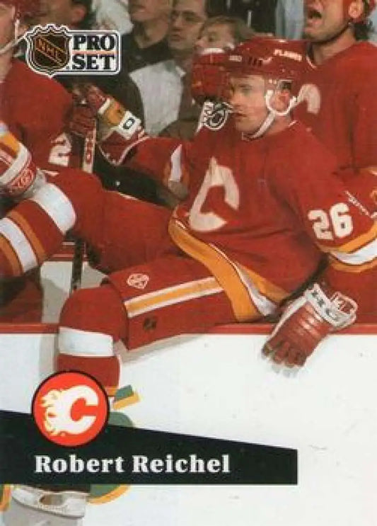 Hockey player in red Calgary Flames jersey #26, featured on Robert Reichel hockey card