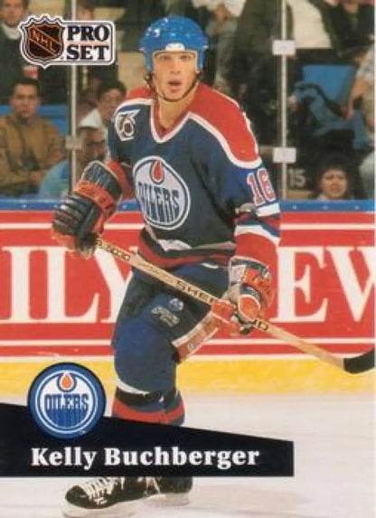 Hockey card of Kelly Buchburger in Edmonton Oilers blue and orange uniform