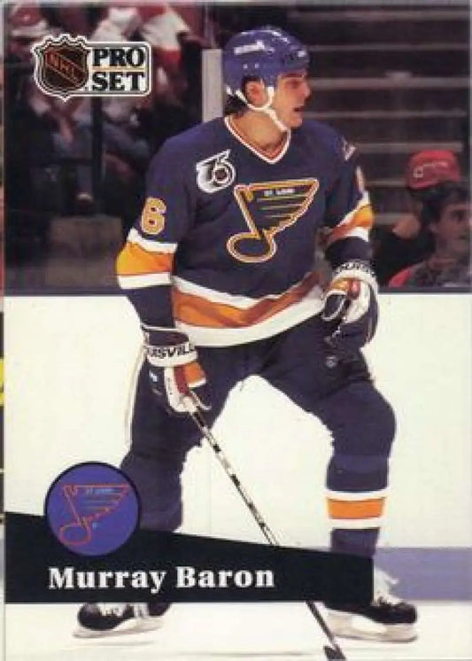 Hockey player in a St. Louis Blues jersey representing Murray Baron San Jose Sharks hockey card