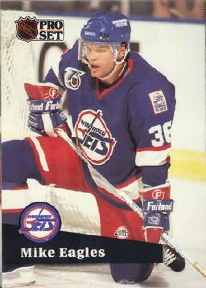 Hockey card of Mike Eagles in navy blue Winnipeg Jets uniform from 1991-92 Pro Set