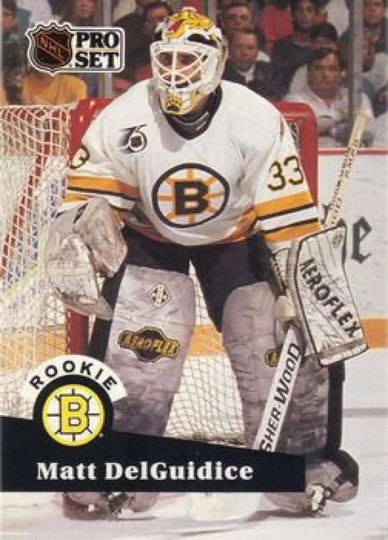 Matt DelGuidice in a Boston Bruins white jersey number 33 on a hockey card