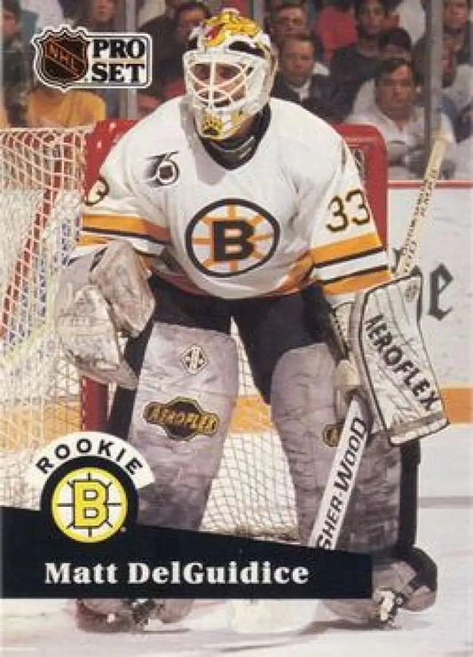 Matt DelGuidice in a Boston Bruins white jersey number 33 on a hockey card