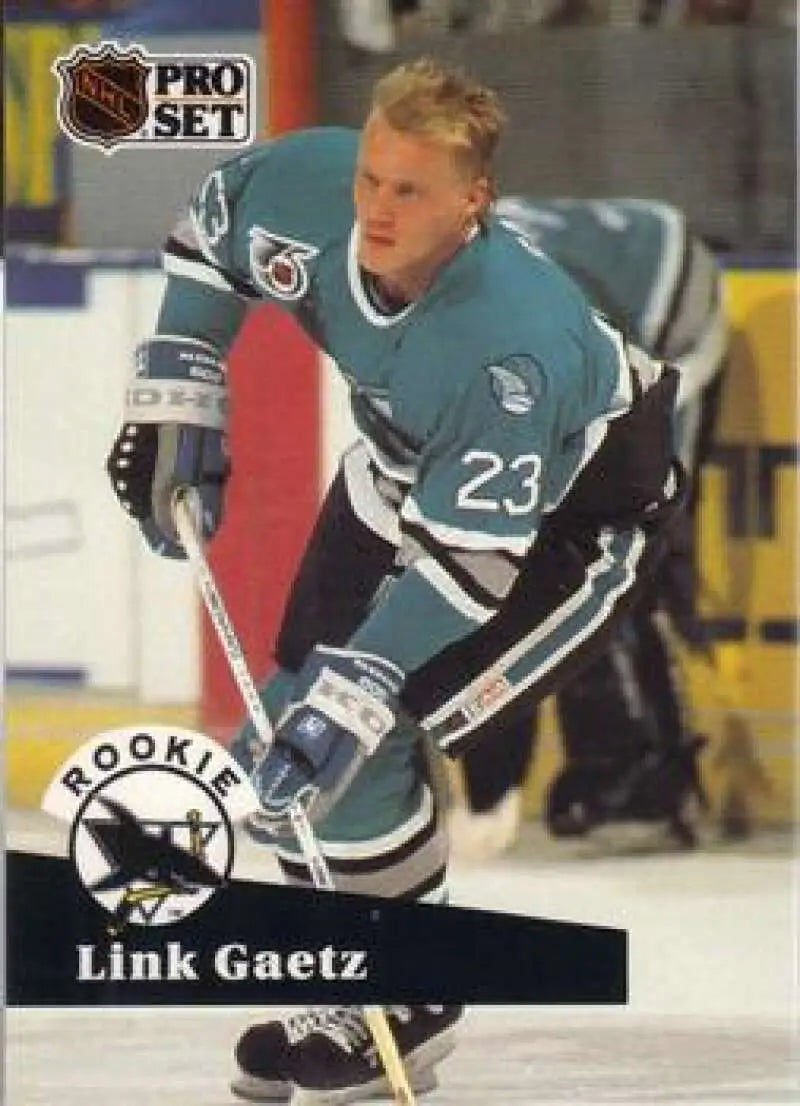 Hockey player in teal #23 San Jose Sharks jersey, featuring Link Gaetz hockey card