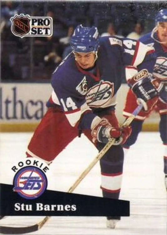 NHL Pro Set hockey card of Stu Barnes in action with the Winnipeg Jets on the ice