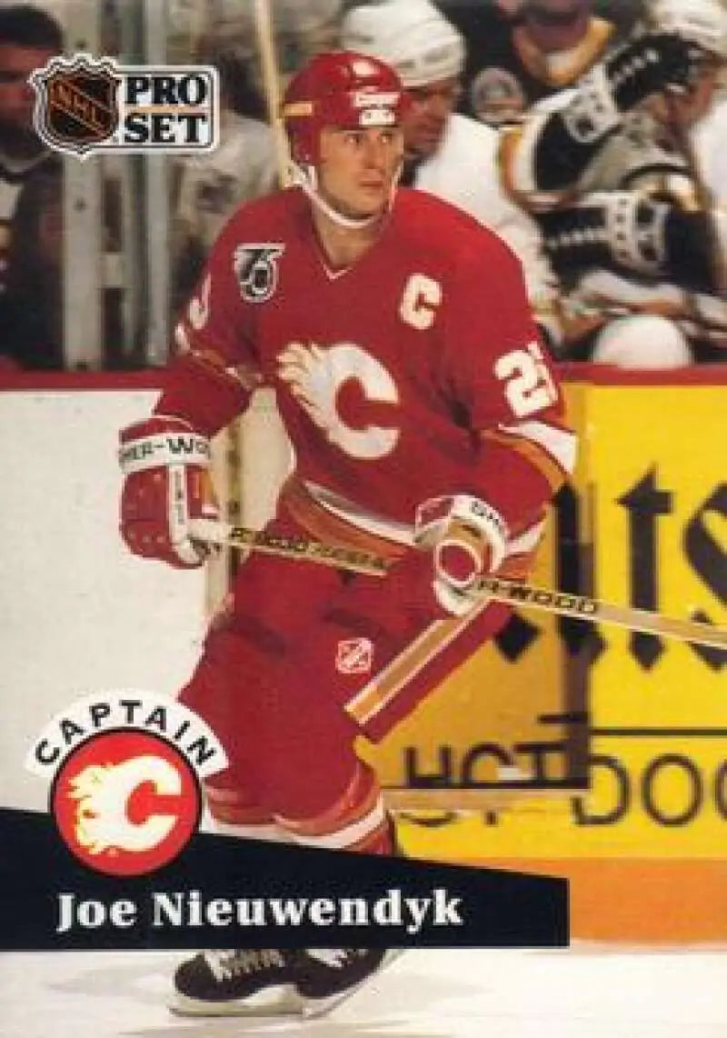 Calgary Flames hockey card featuring Joe Nieuwendyk in red jersey with captain ’C’ designation