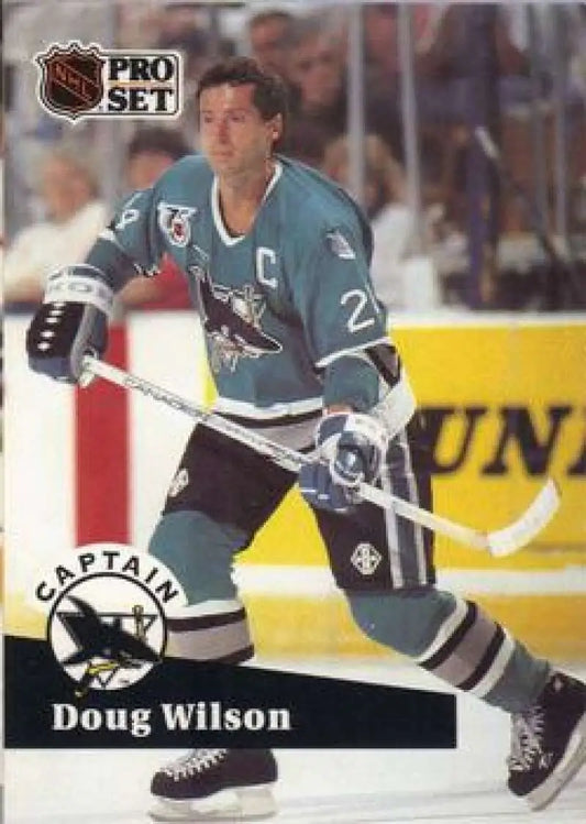 NHL Pro Set hockey card of Doug Wilson, San Jose Sharks player in teal jersey 27