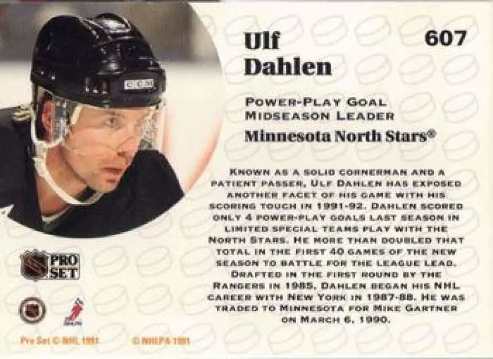 Hockey player in black helmet and Minnesota North Stars jersey, Ulf Dahlen collectible card