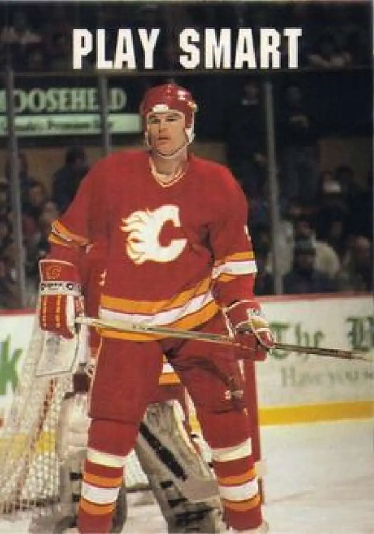 Hockey player in red Calgary Flames jersey on ice for Jim Kyte hockey card