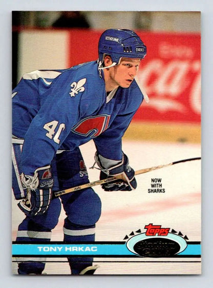 Hockey player in Quebec Nordiques jersey number 41 featured on Tony Hrkac card