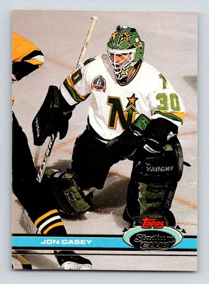 Hockey goalie Jon Casey in Minnesota North Stars uniform number 30 on trading card