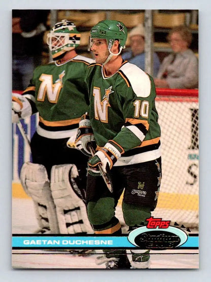 Hockey player wearing green Minnesota North Stars jersey number 10 from Topps Stadium Club