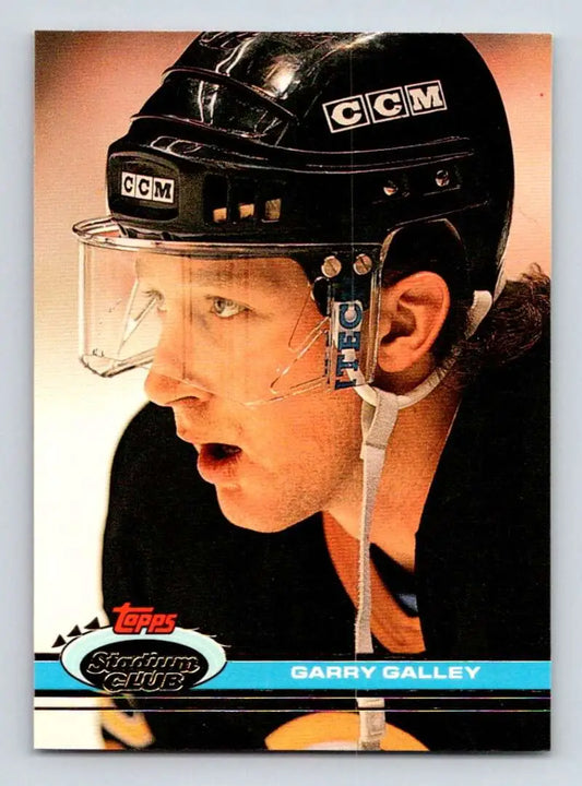 Profile view of hockey player in a black CCM helmet, featuring Garry Galley, Boston Bruins