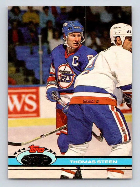 Hockey card of Thomas Steen, Winnipeg Jets captain in blue jersey, 1991-92 Topps