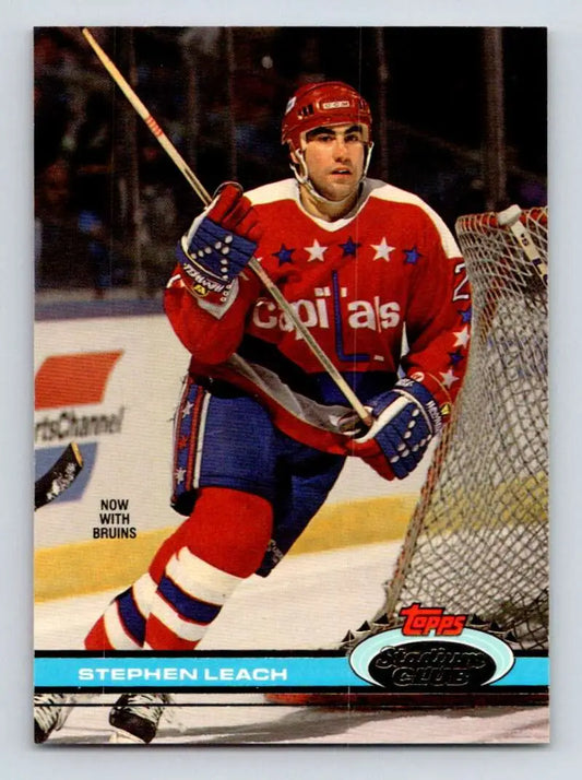 Hockey player in red jersey skating with stick on 1991-92 Topps Stephen Leach card