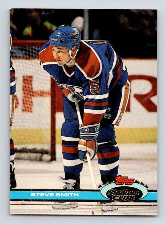 Hockey player Steve Smith in Edmonton Oilers uniform on ice for Topps Stadium Club card