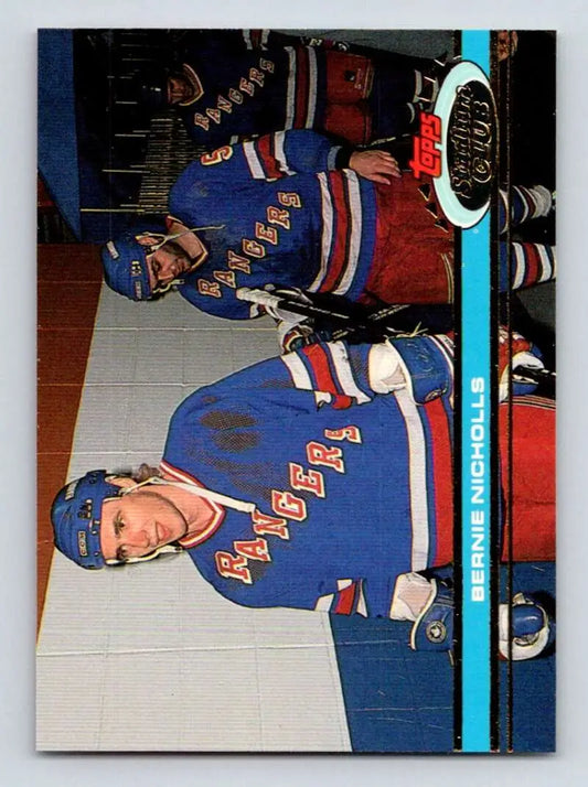 Hockey player in New York Rangers jersey on 1991-92 Bernie Nicholls hockey card