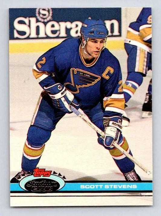 Hockey player in St. Louis Blues uniform with captain’s C on Topps Stadium Club card