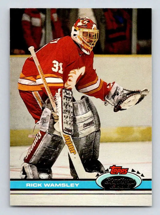 Hockey card of Rick Wamsley in red Calgary Flames jersey #31, 1991-92 Topps Stadium Club