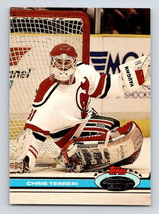 Hockey trading card of Chris Terreri making a save in New Jersey Devils jersey