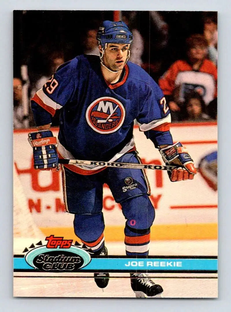 Joe Reekie skating in a New York Islanders jersey for a hockey card display