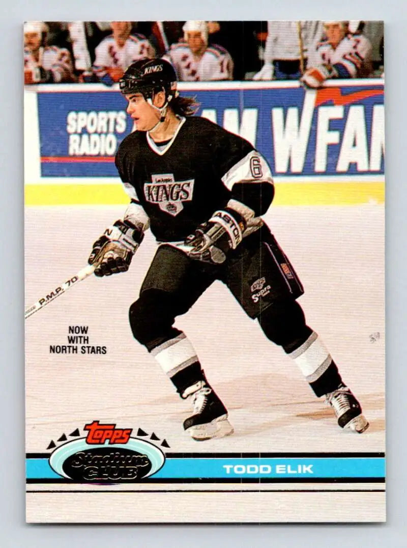 Hockey card of Todd Elik in black jersey for Minnesota North Stars 1991-92 season