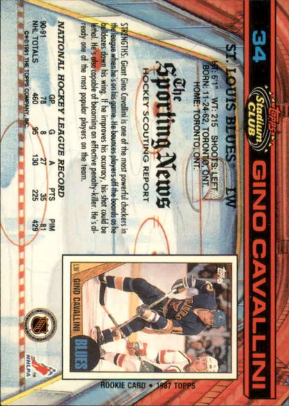 Trading card of Gino Cavallini in black and gold uniform for Louis Blues Topps Stadium Club