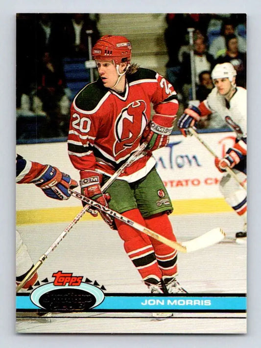 Hockey player in red Jersey Devils jersey #20 demonstrating action for Jon Morris card