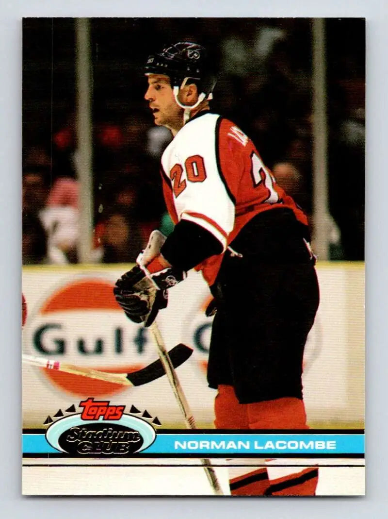 Hockey player in red and black Philadelphia Flyers jersey, Normand Lacombe hockey card