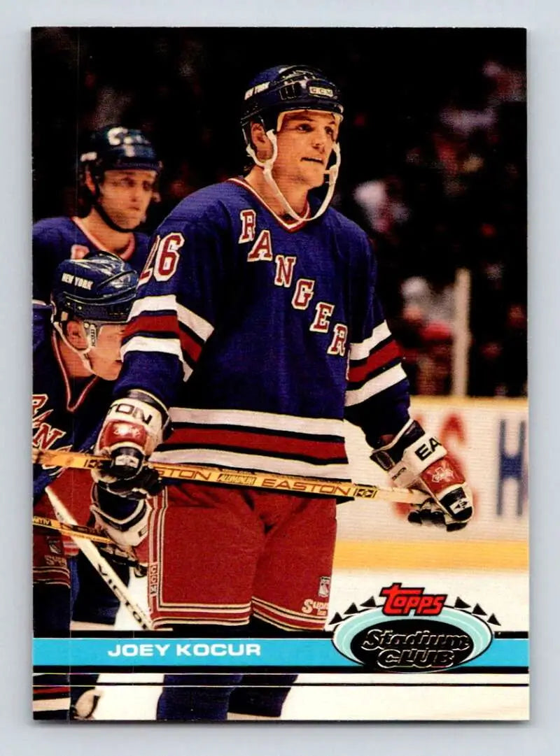 Hockey player in New York Rangers jersey featured on 1991-92 Topps Stadium Club Joey Kocur card