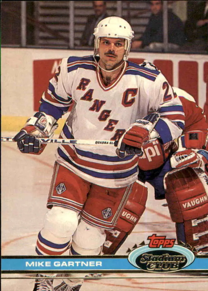 Hockey player in New York Rangers jersey featured on Mike Gartner hockey card