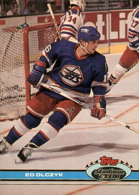 Hockey player in Winnipeg Jets jersey skating during gameplay on Topps Stadium Club card