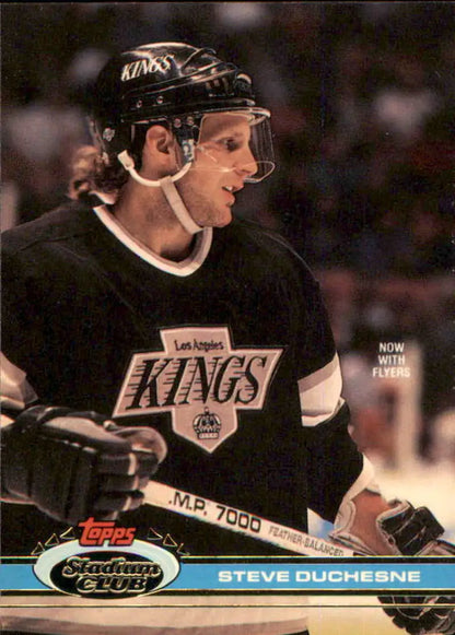 Hockey player in black Los Angeles Kings jersey, featured on Topps Stadium Club card