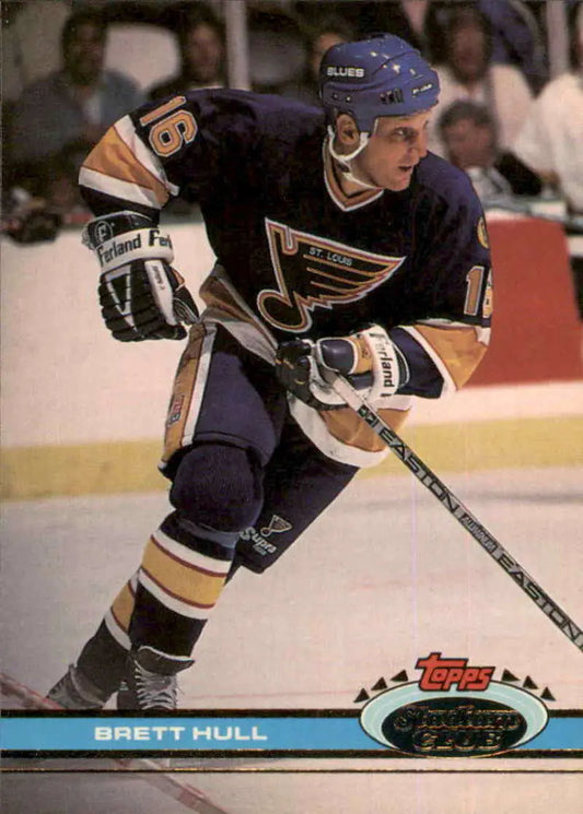 Brett Hull skating in dark blue Louis Blues jersey on 1991-92 Topps Stadium Club card