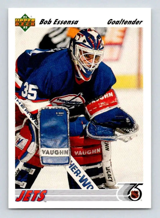 Hockey goalie in blue Winnipeg Jets jersey wearing Vaughn equipment on Bob Essensa card