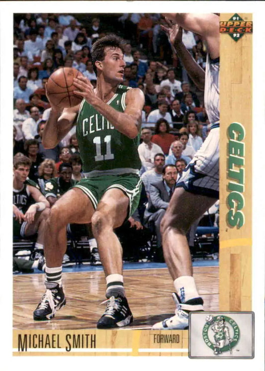 Michael Smith in a Celtics jersey making a post move on this basketball card