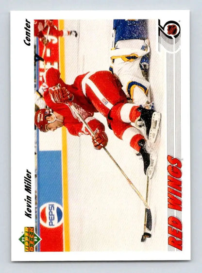 Hockey player in red and white Red Wings uniform from 1991-92 Upper Deck Kevin Miller card