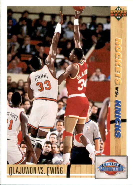 Basketball trading card featuring Hakeem Olajuwon and Patrick Ewing in action